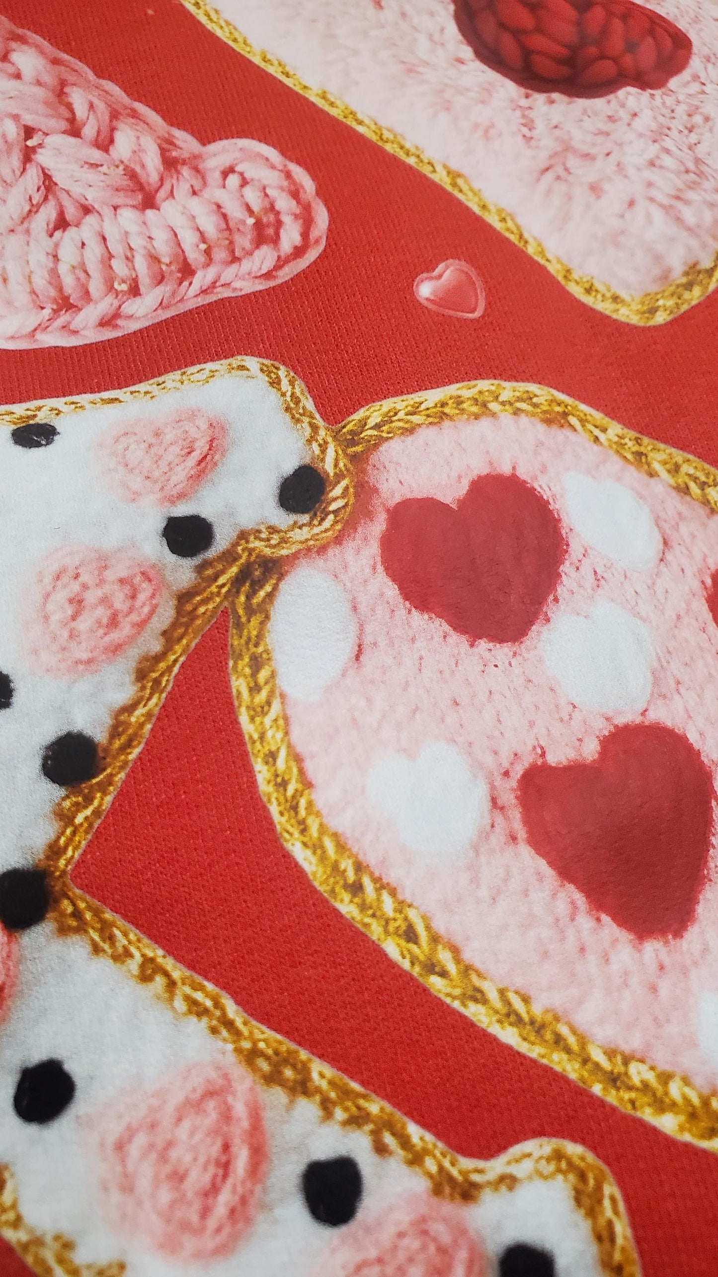 Red sweatshirt featuring faux crochet XO letters and heart shapes with a yarn-textured Valentine design in pink, red, and white tones, Girlfriend Gift, Valentine gift for her, Angela Jasmina, AJ Blanks