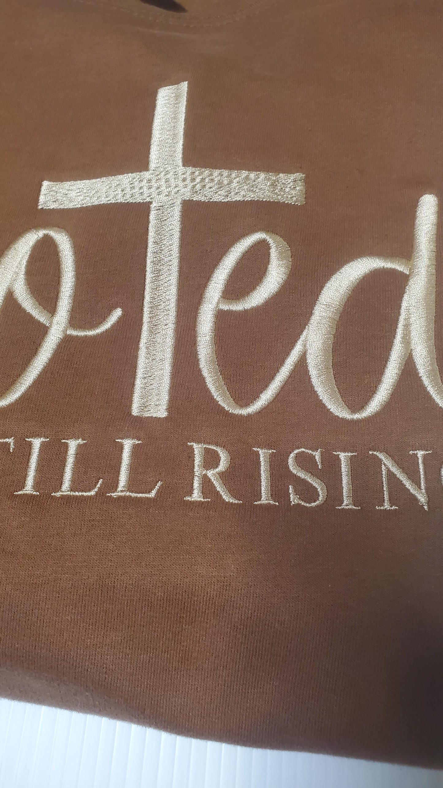 christian sweatshirt, clothing jesus gift, gift spiritual wear, wear blessed pullover, pullover church clothing, gift, gift religious wear, wear cotton sweater, sweater jesus king, king blessed mom, spiritual present,faith sweater, Easter Shirt
Brown crewneck sweatshirt featuring a faith inspired design with a cross and the words Rooted and Still Rising, made on a super soft comfortable sweatshirt available in multiple colors, inspirational Christian women’s pullover Angela Jasmina AJ Blanks